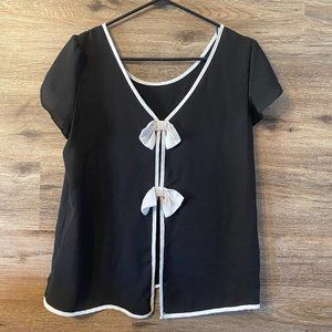 Woman's open back blouse